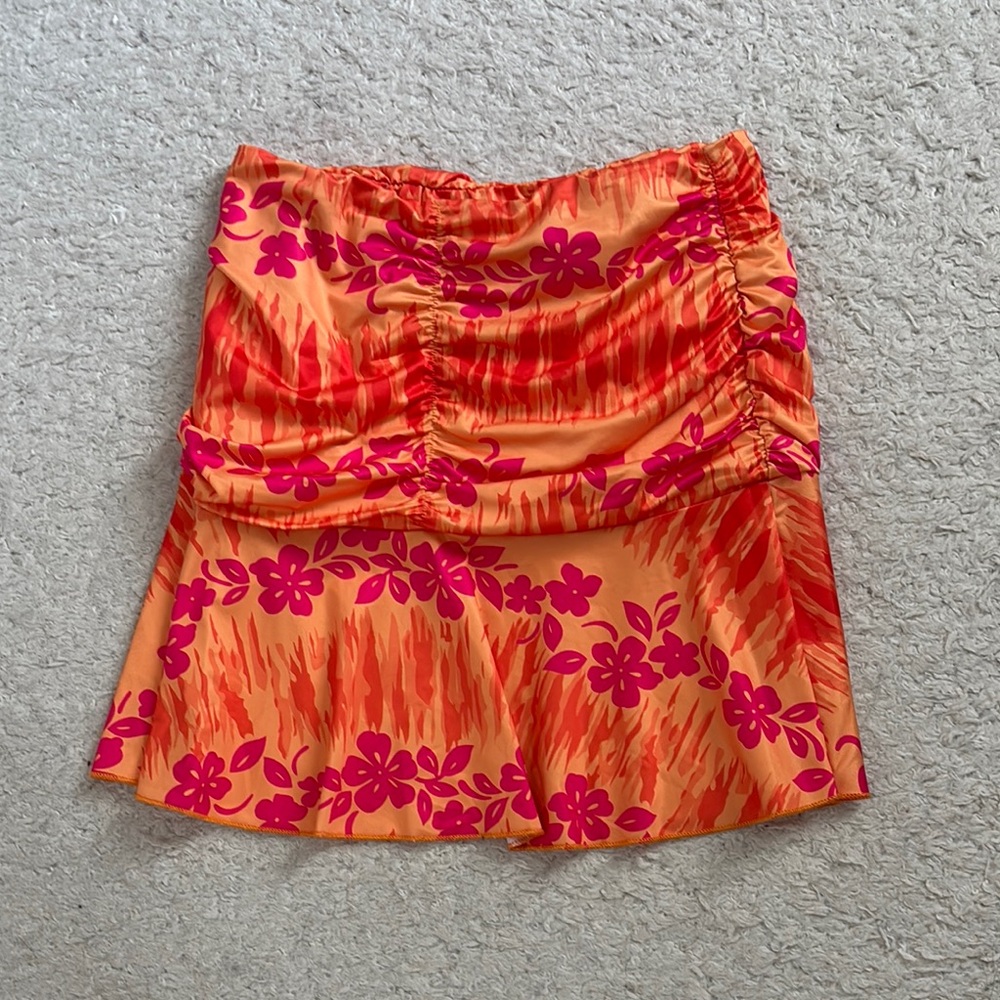 ! NWOT. Cute Orange Skirt with Pink Floral Design